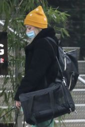Lili Reinhart in a Matching Green Sweatsuit and a Pair of Black Fleece-Lined Snow Boots - Vancouver 12/09/2020