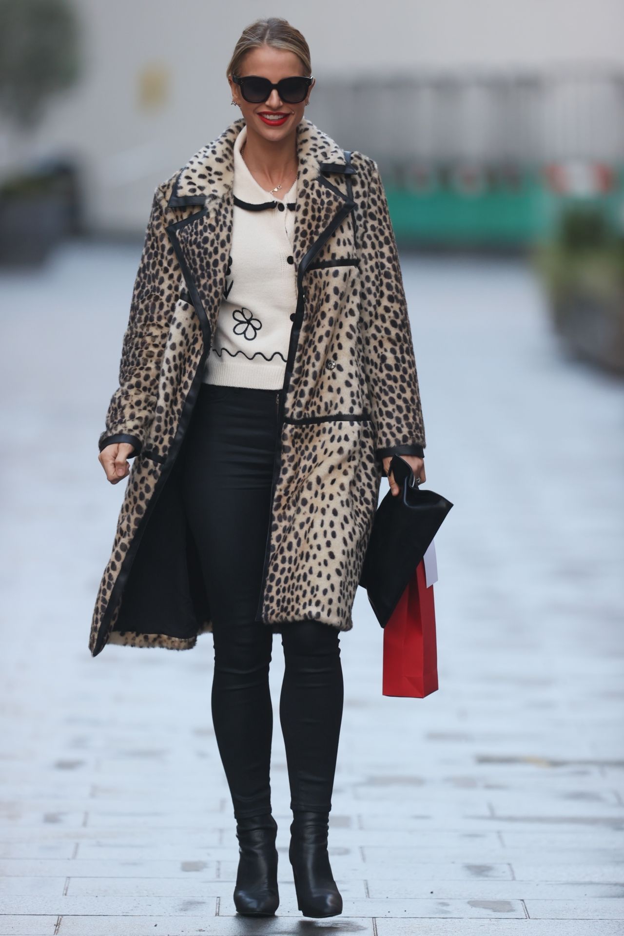 Vogue Williams in Leather Trousers and Animal Print Coat - London 12/20