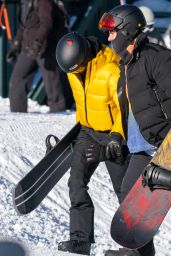 Kendall Jenner in a Ticket-Me-Yellow Prada Jacket and Black Prada Trousers - Aspen 01/02/2021