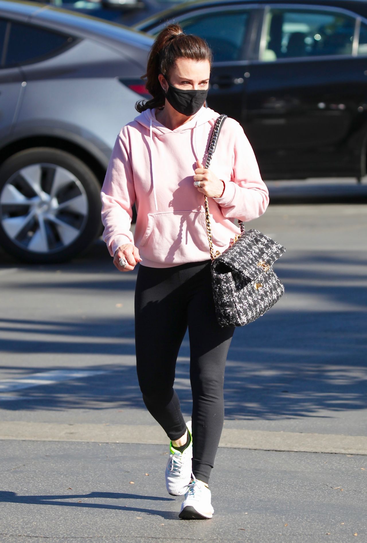 kyle richards wears a blue sweatshirt and leggings as she steps out for  walk with a friend in los angeles-110420_5