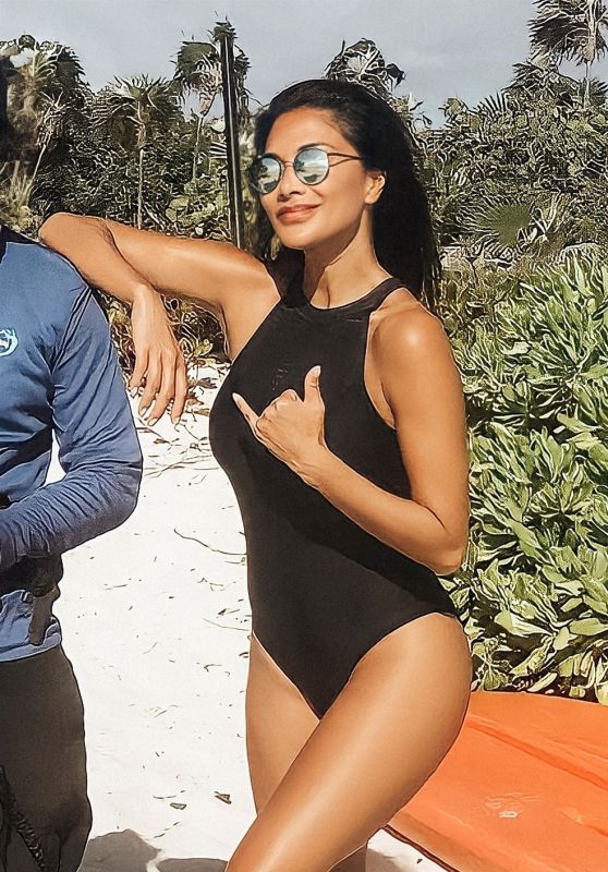 Nicole Scherzinger in a Black Swimsuit at Providenciales, Turks And Caicos Islands 01/05/2021