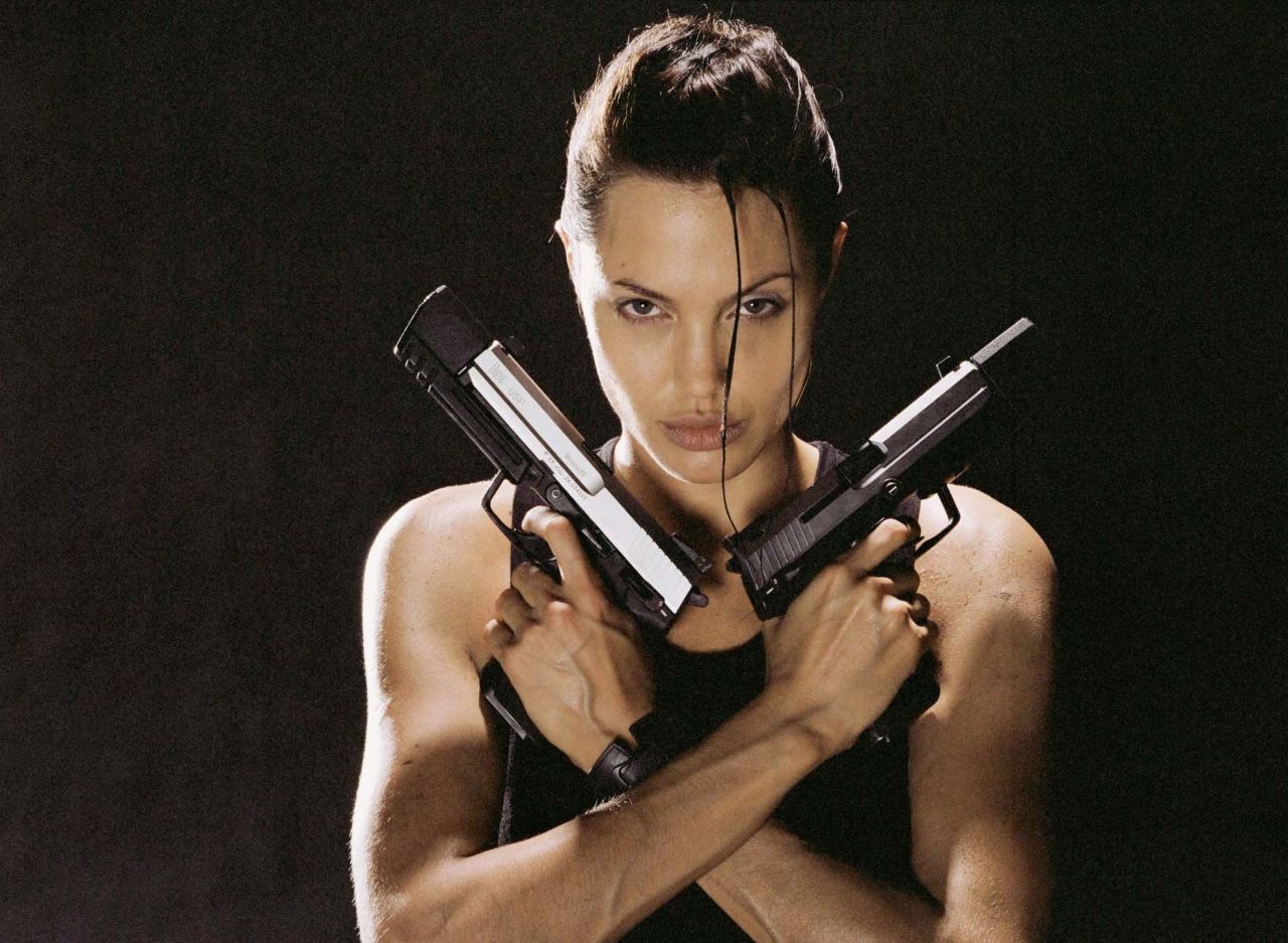 https://celebmafia.com/wp-content/uploads/2021/02/angelina-jolie-lara-croft-tomb-raider-promoshoot-2001-3.jpg