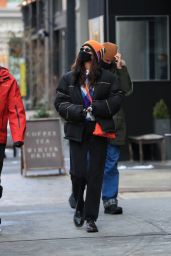 Bella Hadid in Colored Sweater and Orange Beanie - New York 02/11/2021