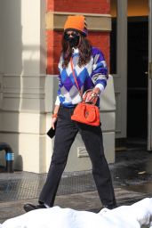 Bella Hadid in Colored Sweater and Orange Beanie - New York 02/11/2021