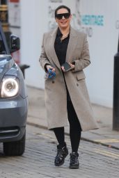 Kelly Brook Looking Chic in a Black Dress and Grey Coat 02/18/2021