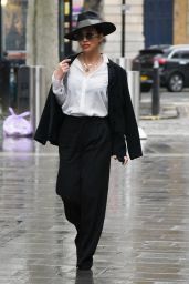 Myleene Klass Wearing a Top Hat and Monochrome Trouser Suit - London 02/03/2021
