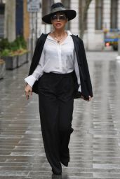 Myleene Klass Wearing a Top Hat and Monochrome Trouser Suit - London 02/03/2021