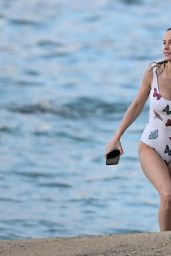 Brie Larson in a Butterfly Swimsuit on vacation in Hawaii 04/19/2021
