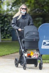 Elsa Hosk - Pushing Newborn Daughter Tuulikki in a Stroller 04/26/2021