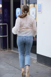 Kelly Brook in a White Blouse and Denim 04/23/2021