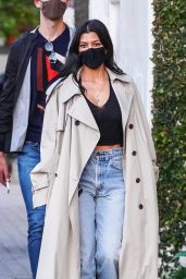 Kourtney Kardashian Wears a Plunging Black Crop Top and Tan Trench Coat at Taverna Tony in Malibu 04/06/2021