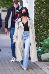 Kourtney Kardashian Wears a Plunging Black Crop Top and Tan Trench Coat at Taverna Tony in Malibu 04/06/2021