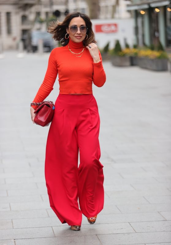 Myleene Klass in Red Trousers and Orange Ribbed Top 04/02/2021 • CelebMafia