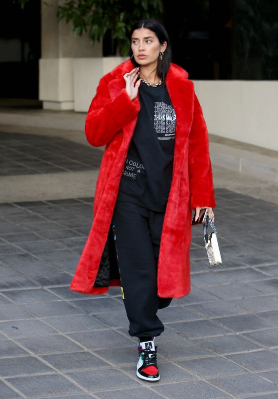 Nicole Williams in an Oversized Phillip Plein Coat With "I