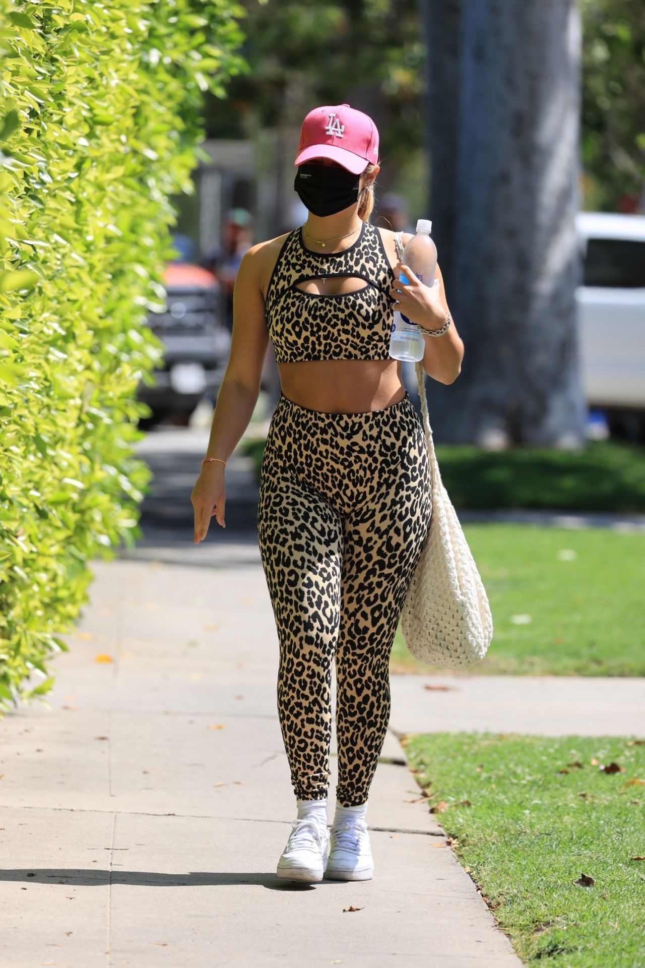 Addison Rae dons a black crop top and leggings for her morning Pilates  session in West