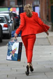 Caprice Wears Red Trouser Suit - London 05/25/2021