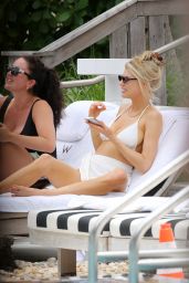 Charlotte McKinney in a White Bikini - Beach in Miami 05/14/2021
