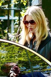 Kate Moss in a Long Black Coat and Dark Sunglasses - London 05/19/2021