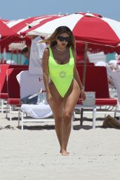 Larsa Pippen in a Neon Yellow Swimsuit at the Beach in Miami 05/28/2021