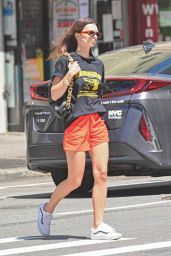Emily Ratajkowski in a Gun-Printed Black Tee and Orange Shorts - NY 06/23/2021
