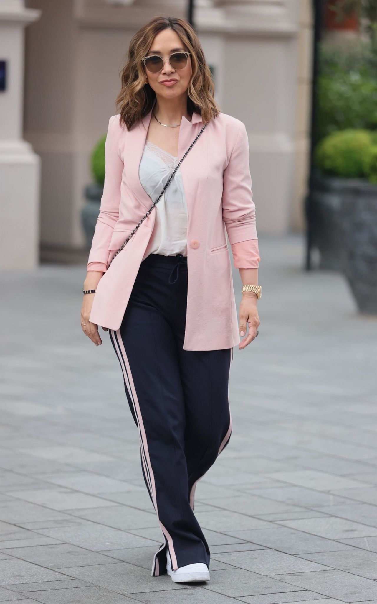 Myleene Klass in a Chic Pink Blazer and Striped Trousers - London 06/04