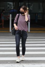 Olivia Wilde in Tight Jeans and Striped Shirt - Airport in LA 06/20/2021