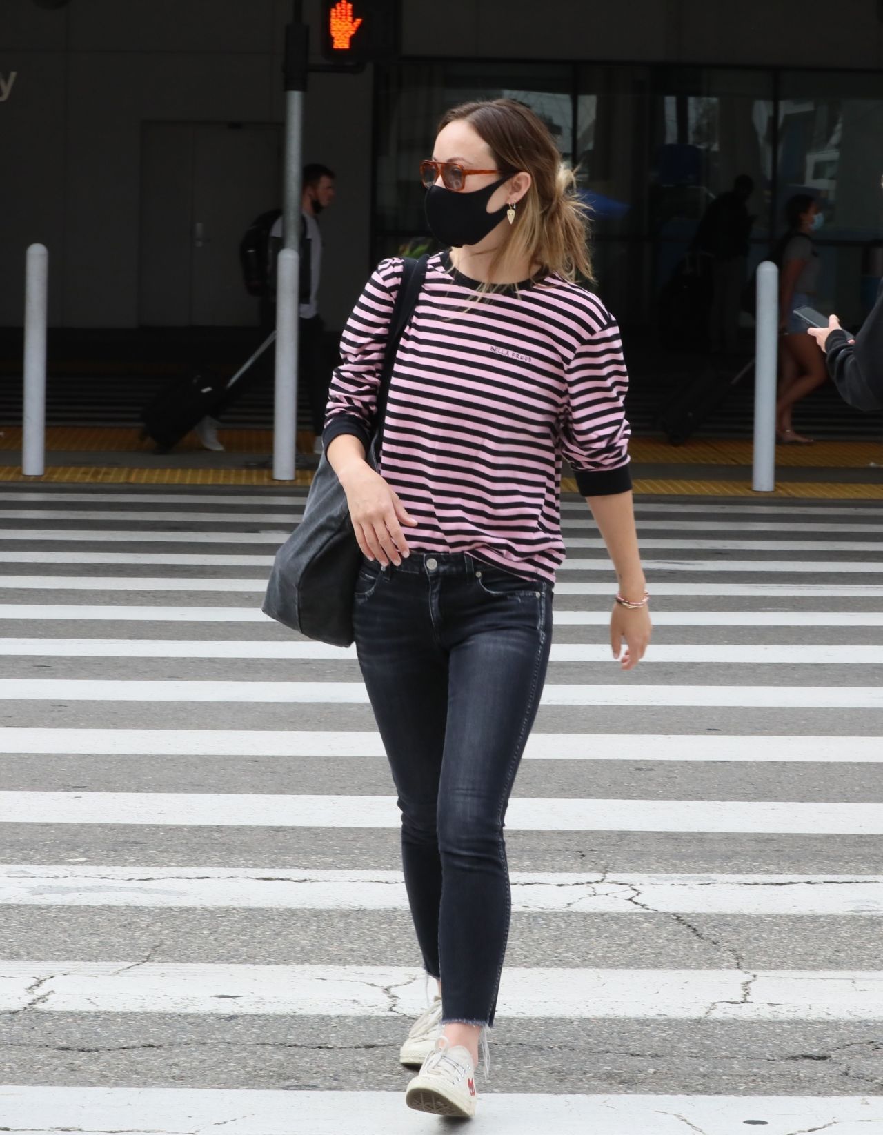 Olivia Wilde in Tight Jeans and Striped Shirt - Airport in LA 06/20 ...