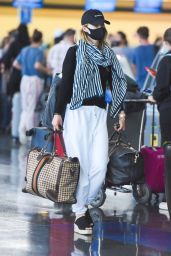 Olivia Wilde in Travel Outfit - JFK Airport in NYC 06/28/2021