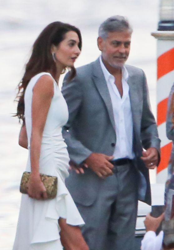 Amal Clooney and George Clooney at the Grand Hotel in Tremezzo 07/19/2021