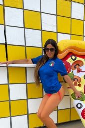 Claudia Romani on a Giant Veggie Pizza Floatie - Miami 07/14/2021