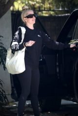 Erika Jayne in Sequin Biker Jacket and Christian Louboutin Boots 02/19