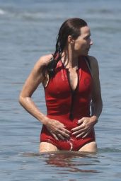Minnie Driver in a Red Swimsuit - Malibu 07/07/2021