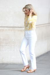 Mollie King in White Denim and Happy Sweater - London 07/03/2021