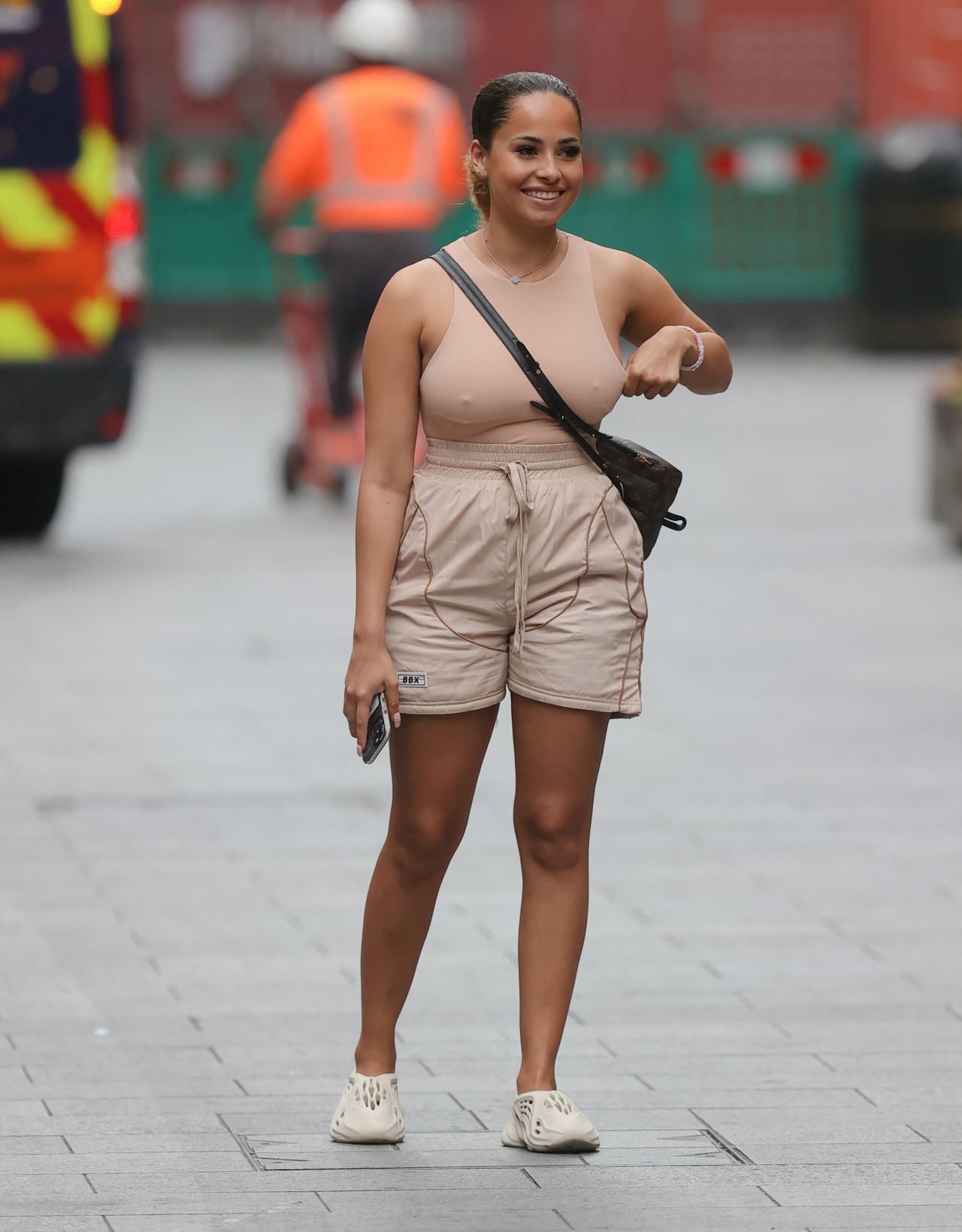 Amber Gill in a Nude Top and Beige Shorts - London 08/23/2021.