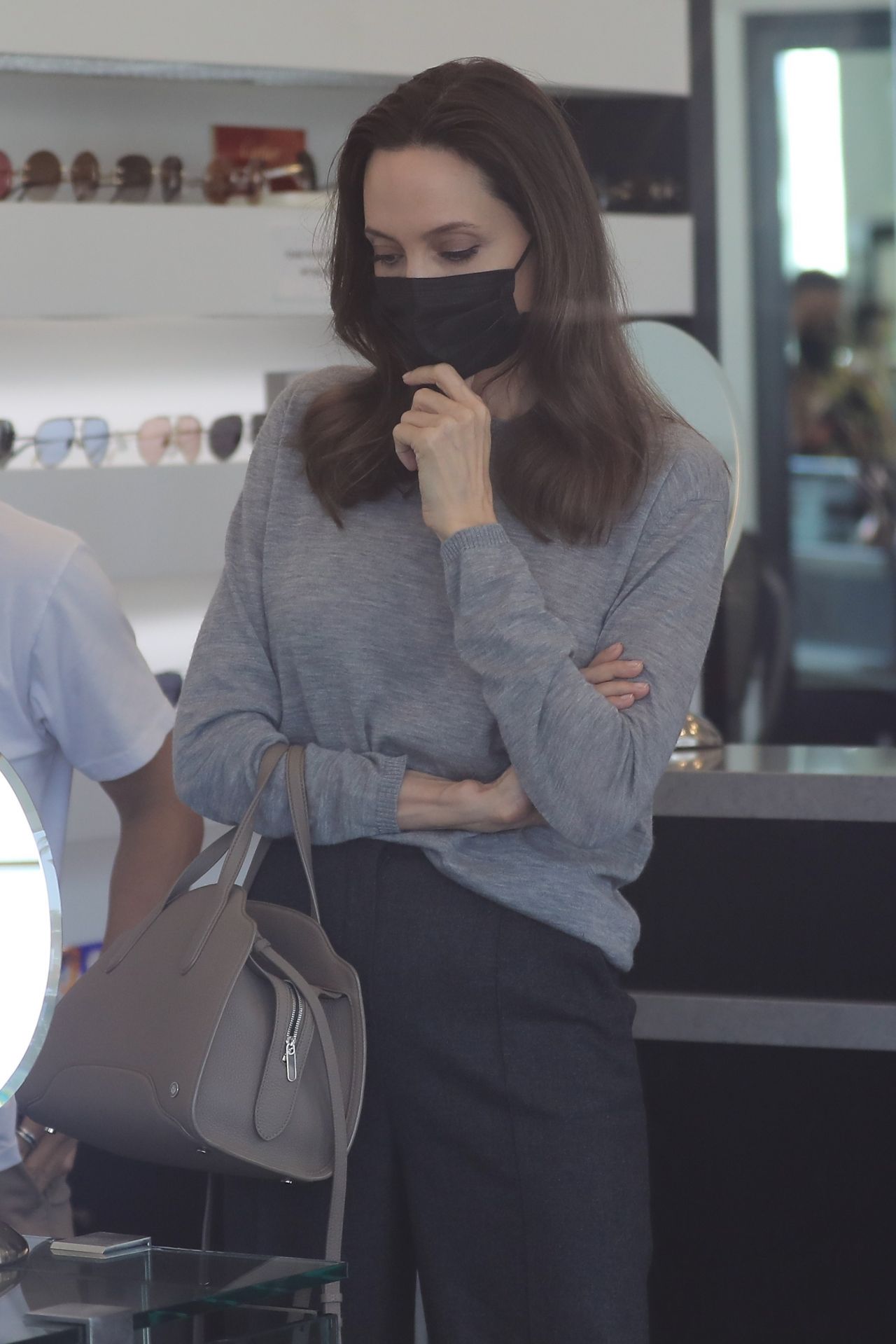 https://celebmafia.com/wp-content/uploads/2021/08/angelina-jolie-shops-for-sunglasses-at-optometrix-professional-eye-care-center-in-beverly-hills-08-13-2021-0.jpg