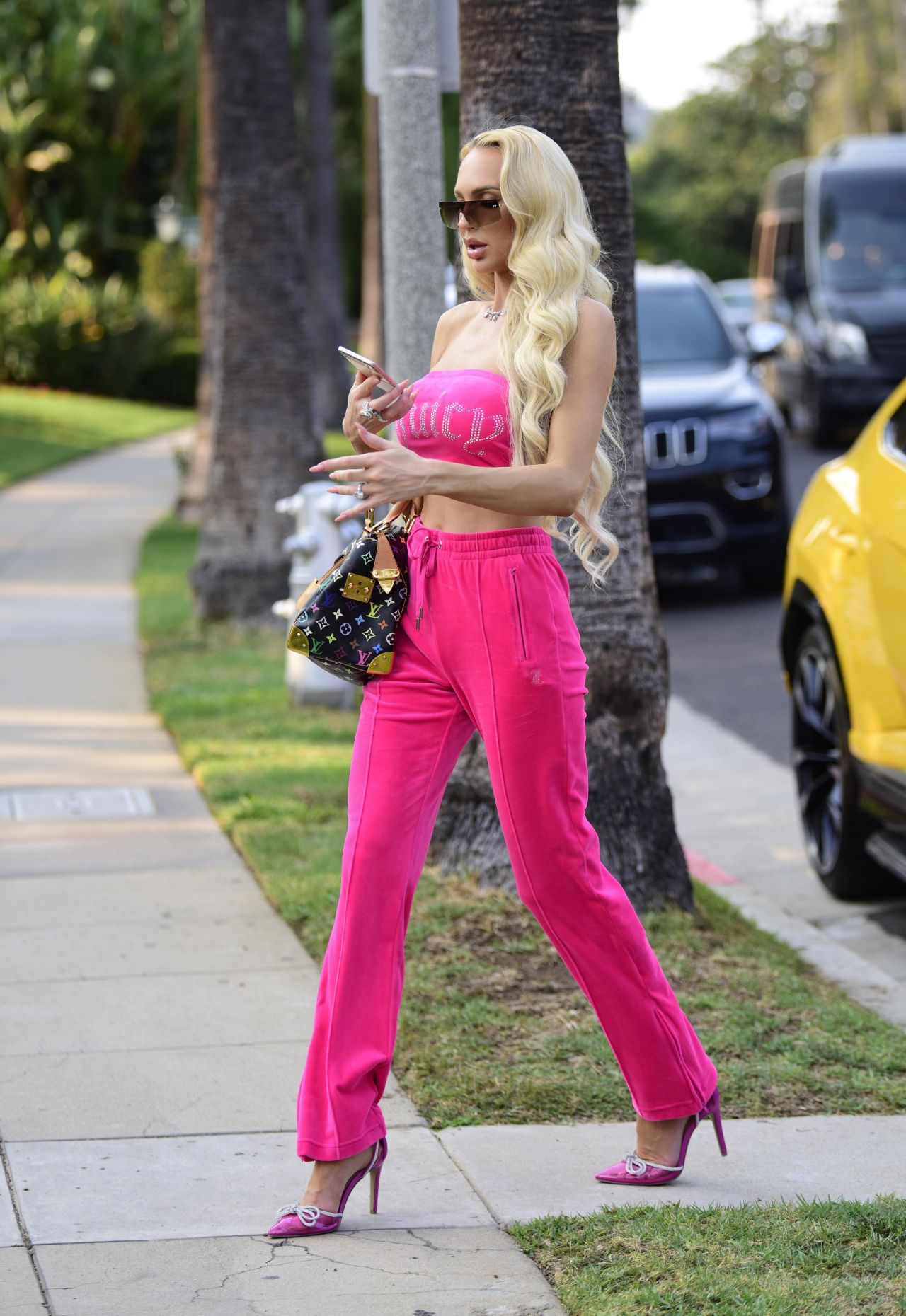 Paris Hilton and Saweetie sport Juicy Couture tracksuits in Bentley for  shoot in Beverly Hills