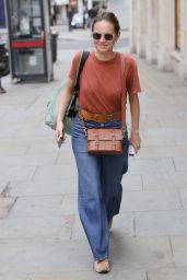 Kara Tointon in Flared Denim Trousers and Beige T Shirt - London 09/12/2021