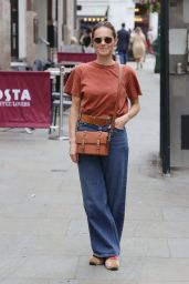 Kara Tointon in Flared Denim Trousers and Beige T Shirt - London 09/12/2021