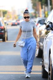 Lori Harvey Wears Blue Sweats and Chanel Bag - West Hollywood 09/20/2021