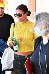 Tina Kunakey in a Yellow Crop Top at Marco Polo in Venice 09/02/2021