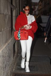 Winnie Harlow in All White With a Pop of Color Donning a Red Jacket - Milan Fashion Week 09/25/2021