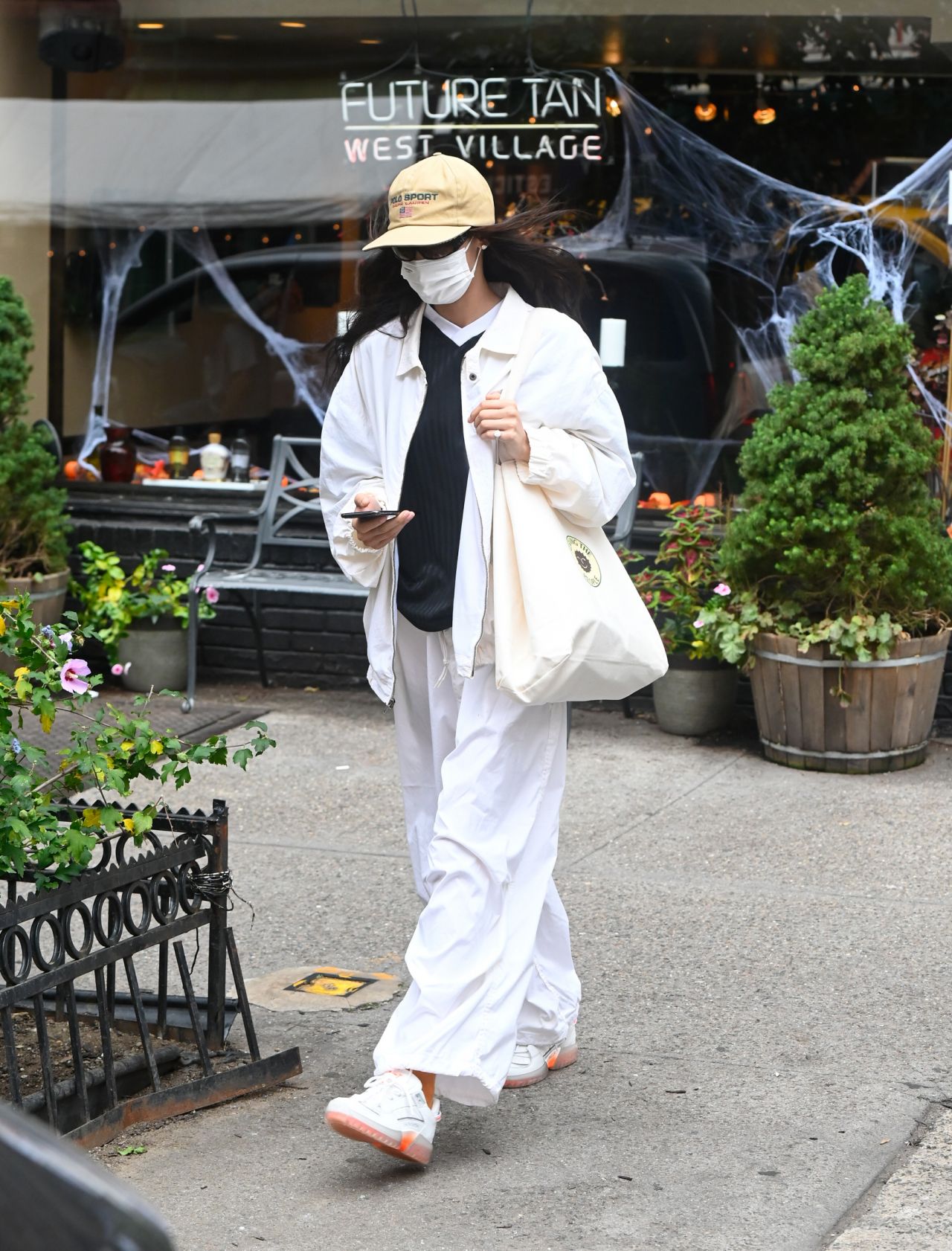 Bella Hadid in a White Ralph Lauren Tracksuit - New York 10/13/2021 •  CelebMafia