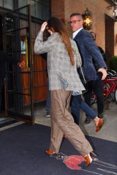 Dakota Johnson Wears a Plaid Blazer and Striped Pants - New York 09/30/2021