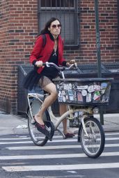 Famke Janssen - Cycling Wearing a Red Bomber Jacket and Black Tutu Skirt - New York 10/20/2021