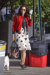 Famke Janssen Wears a Red Bomber Jacket and a White Heart-Printed Skirt - West Village in NY 10/18/2021