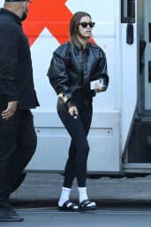Hailey Rhode Bieber in Black Leather Bomber Jacket and Skintight Leggings (more photos 10/05/2021)
