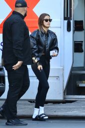 Hailey Rhode Bieber in Black Leather Bomber Jacket and Skintight Leggings (more photos 10/05/2021)