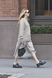 Jennifer Lawrence in a Grey Sweater, Matching Skirt and Christian Dior Handbag - New York 10/06/2021