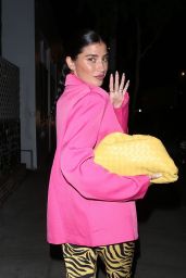 Nicole Williams in a Pair of Yellow and Black Jagger and Stone Pants amd a Yellow Bottega Veneta Handbag - West Hollywood 10/17/2021