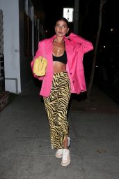 Nicole Williams in a Pair of Yellow and Black Jagger and Stone Pants amd a Yellow Bottega Veneta Handbag - West Hollywood 10/17/2021